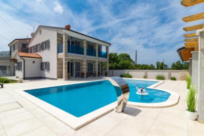 Villa Hacienda Del Campo for 18 people near Pula with large garden and children playground